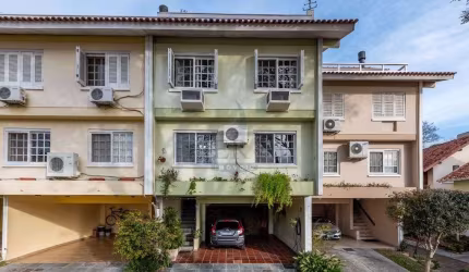 Casa em condomínio fechado com 4 quartos à venda na Rua Padre João Batista Reus, 983, Tristeza, Porto Alegre por R$ 1.166.000