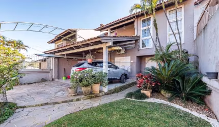 Casa com 3 quartos à venda na Rua Fortunato Della Casa, 45, Ipanema, Porto Alegre por R$ 954.000