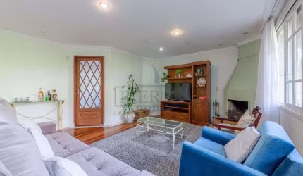 Casa em condomínio fechado com 4 quartos à venda na Rua Doutor Arnaldo da Silva Ferreira, 450, Jardim Isabel, Porto Alegre por R$ 1.300.000