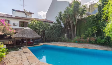 Casa com 3 quartos à venda na Rua Edgar Luiz Schneider, 100, Jardim Isabel, Porto Alegre por R$ 1.800.000