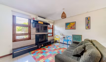 Casa em condomínio fechado com 3 quartos à venda na Rua Guatambu, 645, Hípica, Porto Alegre por R$ 660.000