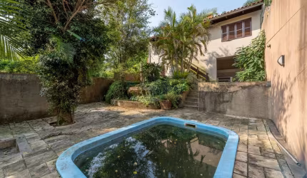Casa com 3 quartos à venda na Rua Edgar Luiz Schneider, 490, Jardim Isabel, Porto Alegre por R$ 1.290.000