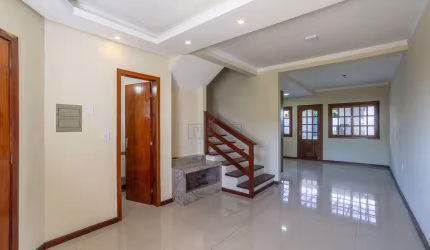 Casa com 3 quartos à venda na Rua dos Carijós, 324, Espírito Santo, Porto Alegre por R$ 699.000
