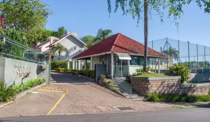 Casa em condomínio fechado com 3 quartos à venda na Rua Padre João Batista Reus, 983, Tristeza, Porto Alegre por R$ 1.060.000