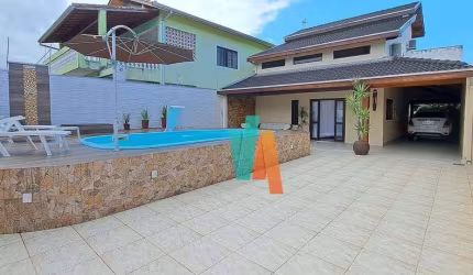 Casa com 4 dormitórios à venda, 246 m² por R$ 1.000.000 - Indaiá - Caraguatatuba/SP
