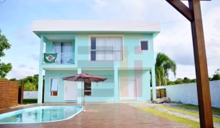 Casa em condomínio fechado com 4 quartos à venda na Rua das Goiabas, 2850, Canasvieiras, Florianópolis por R$ 1.990.000
