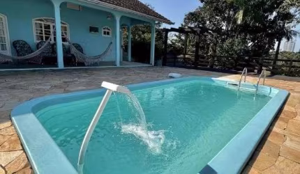 Casa com 3 dormitórios, piscina e mobília120 m² por R$ 1.300.000 - Santo Antonio