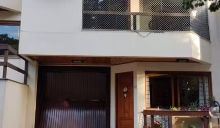 Casa de condomínio, com 3 dormitórios, sendo 1 suíte, 3 vagas, no bairro Nonoai,
