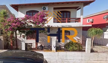Casa com 3 quartos à venda na Rua José Luiz de Souza, 2345, Flor de Nápolis, São José por R$ 1.150.000