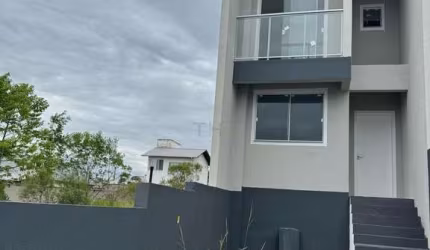 Casa com 2 quartos à venda na Rua Delgísia Maria de Souza, 3456, Sertão do Maruim, São José por R$ 430.000