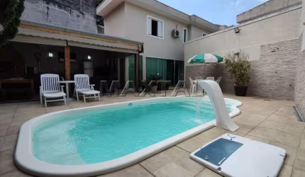 Casa com 5 Dormitórios sendo 4 Suítes 6 Banheiros, 3 Vagas com Piscina e Área Gourmet   Vila Gustavo