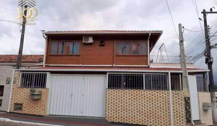 Casa com 5 dormitórios à venda, 240 m² por R$ 1.200.000,00 - Forquilhas - São José/SC