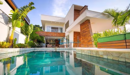 Casa com 6 dormitórios, 531 m² - venda por R$ 9.500.000,00 ou aluguel por R$ 5.000,00/dia - Riviera Módulo 12 - Bertioga/SP