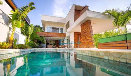 Casa com 6 dormitórios, 531 m² - venda por R$ 9.500.000,00 ou aluguel por R$ 5.000,00/dia - Riviera Módulo 12 - Bertioga/SP