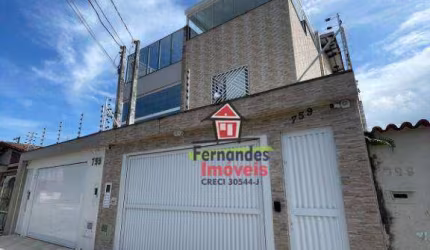 Sobrado com 3 dormitórios à venda, 219 m² por R$ 1.100.000,00 - Canto do Forte - Praia Grande/SP