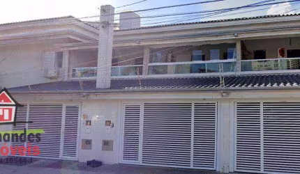 Sobrado com 4 dormitórios à venda, lado praia, 197 m² por R$ 980.000 - Canto do Forte - Praia Grande/SP
