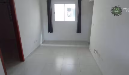 Casa de condomínio com 2 dormitórios à venda, 60 m² por R$ 290.000 - Aviação - Praia Grande/SP