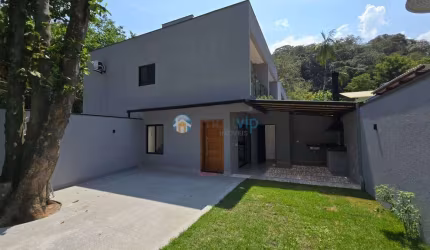 Elegante Casa na Praia de Boiçucanga com 3 Dormitórios