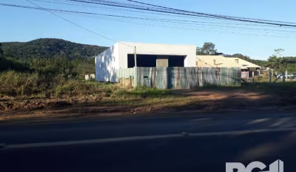 Prédio comercial para compra em Porto Alegre, imóvel com 200m², semipronto. Prédio bem localizado na Avenida Edgar Pires de Castro. Venha conhecer!