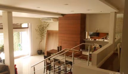 Excelente casa/sobrado em condomínio padrão, no bairro Santa Tereza, 3 dormitórios, suíte master, closet, lareira, linda vista panorâmica para o Guaíba,  escadas com detalhes em madeira tipo demolição