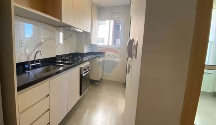 Apartamento para alugar em Centro de 69.00m² com 2 Quartos, 1 Suite e 1 Garagem