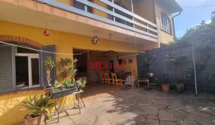 Casa em condomínio fechado com 4 quartos à venda na Rua Bernardino Caetano Fraga, 511, Medianeira, Porto Alegre por R$ 660.000