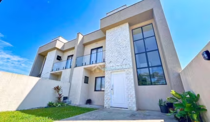 Sobrado com 3 dormitórios à venda, 121 m² por R$ 850.000,00 - Coroados - Guaratuba/PR