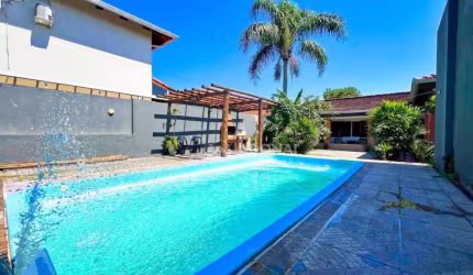 Casa com 4 dormitórios à venda, 142 m² por R$ 750.000,00 - Brejatuba - Guaratuba/PR
