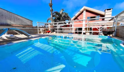 Casa com 4 dormitórios à venda, 300 m² por R$ 1.400.000,00 - Centro - Guaratuba/PR