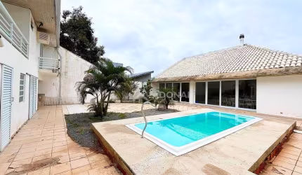 Casa com 7 dormitórios à venda, 324 m² por R$ 980.000,00 - Centro - Guaratuba/PR