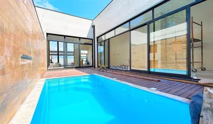 Casa com 3 dormitórios à venda, 133 m² por R$ 1.290.000,00 - Brejatuba - Guaratuba/PR