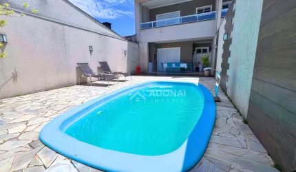 Sobrado com 3 dormitórios à venda, 159 m² por R$ 795.000,00 - Nereidas - Guaratuba/PR