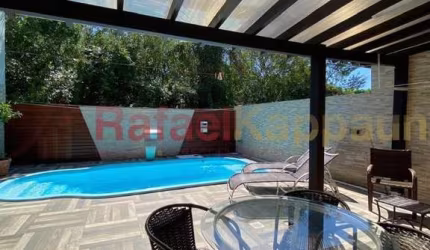 Casa com 3 quartos à venda na Rua João de Barro, Canasvieiras, Florianópolis por R$ 1.150.000