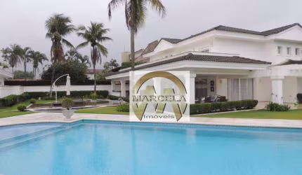 Casa à venda com 5 suítes, 7 vagas de garagem  - Jardim  Acapulco - Guarujá/SP