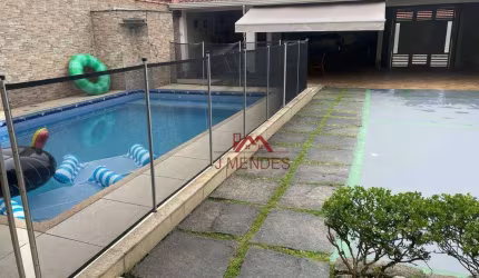 Casa com 3 dormitórios à venda, 211 m² por R$ 890.000,00 - Jardim Real - Praia Grande/SP