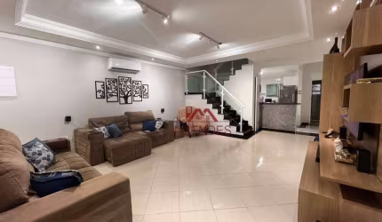 Sobrado com 3 dormitórios à venda, 121 m² por R$ 595.000,00 - Maracanã - Praia Grande/SP