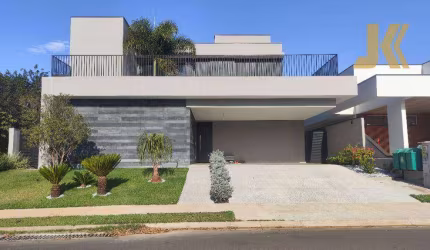 Casa com 3 dormitórios à venda, 331 m² por R$ 3.150.000,00 - Condomínio Tambore - Jaguariúna/SP