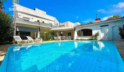 Casa em condomínio fechado com 4 suítes - Área de lazer com piscina e churrasqueira - 4 vagas - Jardim Acapulco - Guarujá/SP.