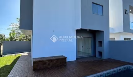 Casa com 3 quartos à venda na Avenida Porto Novo, 124, Ibiraquera, Imbituba, 160 m2 por R$ 780.000
