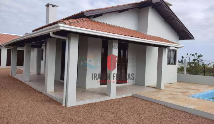 Casa com 3 dormitórios à venda por R$ 630.000,00 - Arroio Texeira - Capão da Canoa/RS