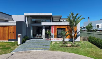 Casa com 4 dormitórios à venda, 180 m² por R$ 1.950.000 - Centro - Xangri-lá/RS