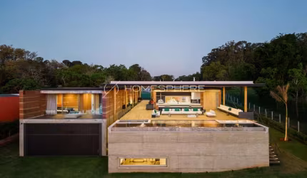 Casa na Represa Jurumirim Em Avaré, SP. Casa Píer / Sergio Sampaio Archi + Tectônica, 1180 m², 6 suítes, vista para represa e pôr do sol, móveis assinados, casa nova em Avaré Represa Jurumirim - SP