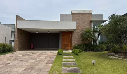 Casa em condomínio fechado com 4 quartos à venda na Rua Onório Germano, 2009, Araça, Capão da Canoa por R$ 1.600.000