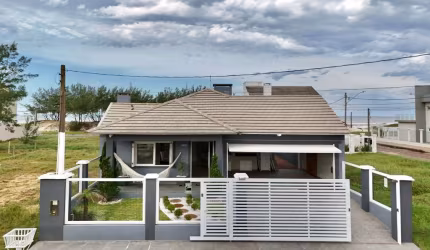 Casa com 4 quartos à venda na Rua Porto Belo, 1097, Atlântida, Capão da Canoa, 176 m2 por R$ 949.000