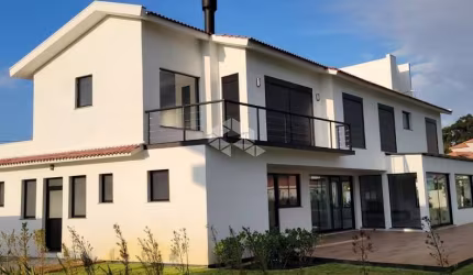 Casa no Condomínio Green Village em Xangri-lá à venda, com 3 quartos/dormitórios, 2 vagas/box, no condomínio Green Village Golf Club, Xangri-Lá/RS