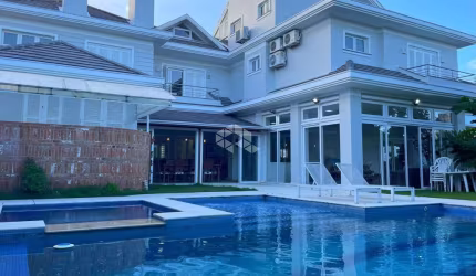 CASA EM CONDOMÍNIO ALTO PADRÃO, 4 DORMITÓRIOS, 3 SUÍTES E 4 BOX!