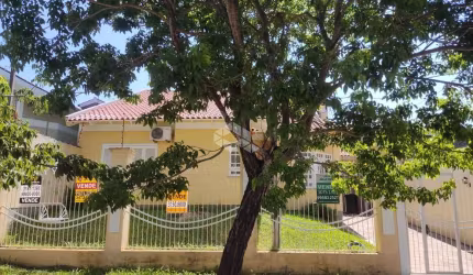 Casa 3 dormitórios, sendo 1 Suíte com hidro, sala de estar, sala de jantar, cozinha, espaço gourmet com churrasqueira no Bairro Bela Vista em Canoas.
