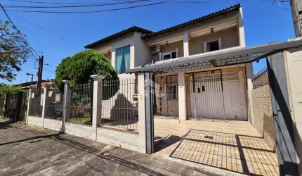 Casa 4 dormitórios com 2 suítes, hidromassagem, pátio com piscina, sala de estar e jantar. A venda no Bairro Bela Vista- Canoas