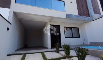 SOBRADO 3 SUÍTES 2 VAGAS E PISCINA a venda por R$ 1.049.000 - CAMBORIÚ SC