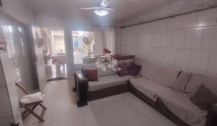 Casa à venda com 3 quartos e 1 sala comercial em Biguaçu/SC.